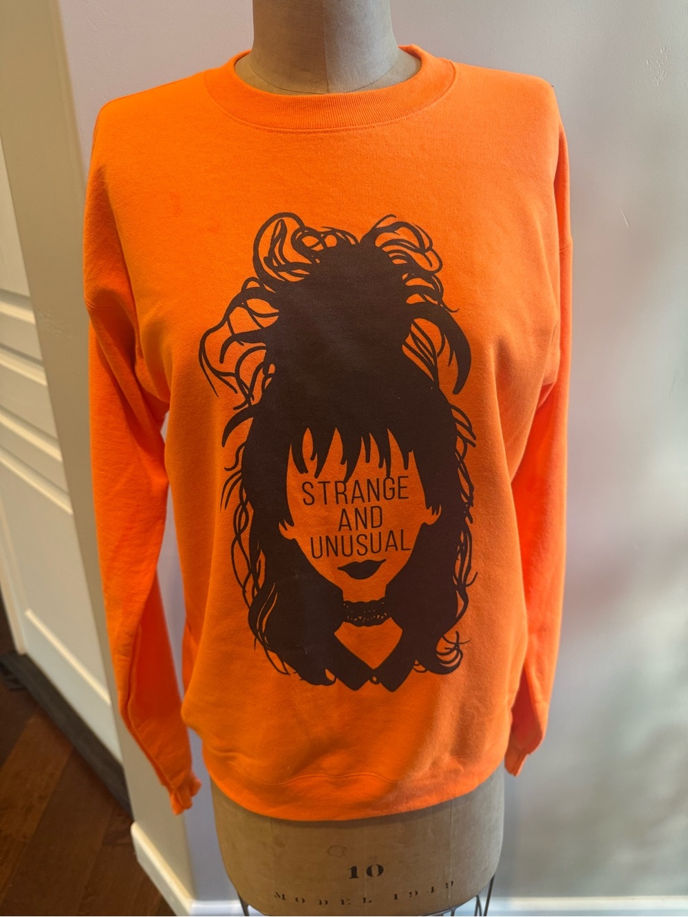 Crewneck Sweatshirt with 'Strange and Unusual' Design. Halloween.